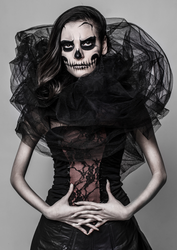 Your LBD and greasepaint of skull mask makeup is all you need this Halloween!