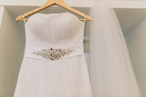 A wedding dress on the hanger may look completely different when you wear it!
