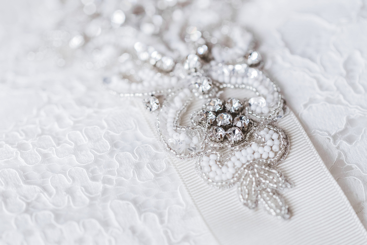 Extra beading or a nice brooch can help hide a last-minute stain on your wedding dress